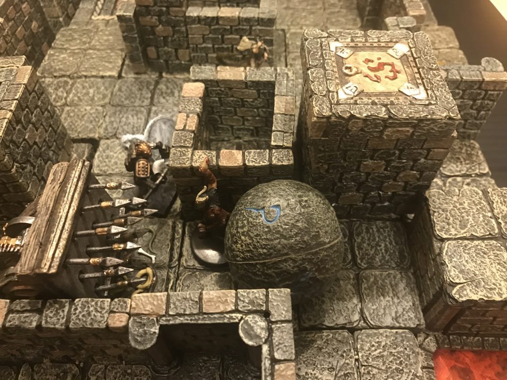 Dwarven Forge terrain is used to create bottlenecks and pressure the characters with dangerous traps.