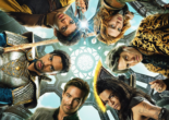 Promotional picture from the D&D movie, showing the actors gathered in a circle, looking down at the camera.